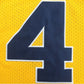 NCAA University of Michigan No. 4 Chris Webber Yellow Premium Mesh Jersey